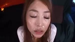 Two cocks making cum mess out of her face