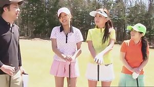 Cute Asian teens play a game of strip golf